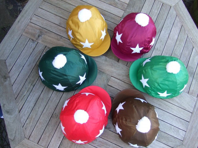 Clockwise from top right: Maroon, Emerald green, Brown, Red, Dark Green, Gold.