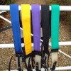 Breast girths in royal blue, yellow, purple, black and green