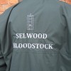 Dark green fleece lined jacket with embroidery.