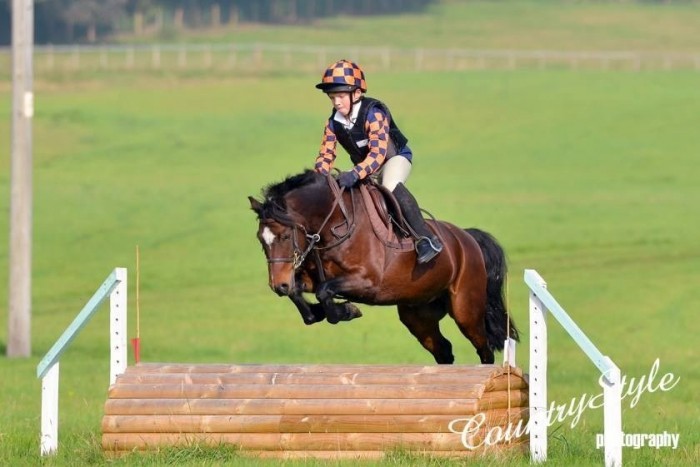Joseph Walters and his pony Sam looking very professional at a hunter trial.