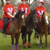 Hereford &amp; Worcester Mounted Games team Hereford and Worcester Mounted Games team in red and mauve bespoke sweatshirts and matching lycra caps