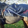 Standard Waterproof Exercise Sheet in dark blue with light blue trim and embroidered initials.